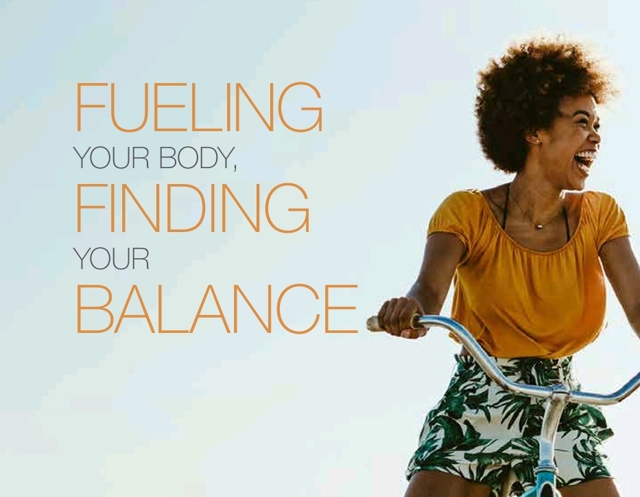 Woman biking, promoting health and balance.